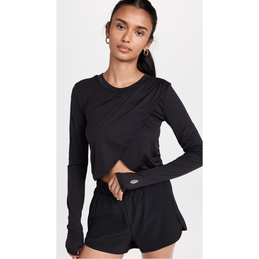 NWT Free People Movement With A Twist Layer Top in size medium